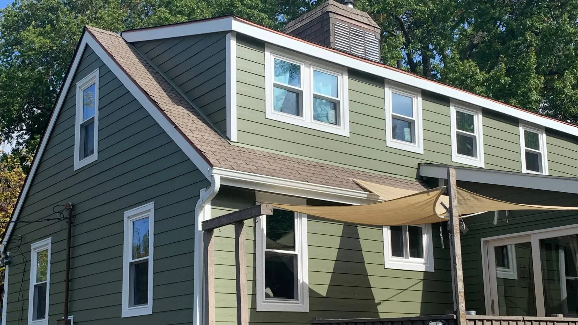 Green James Hardie siding replacement on Bonner Springs home