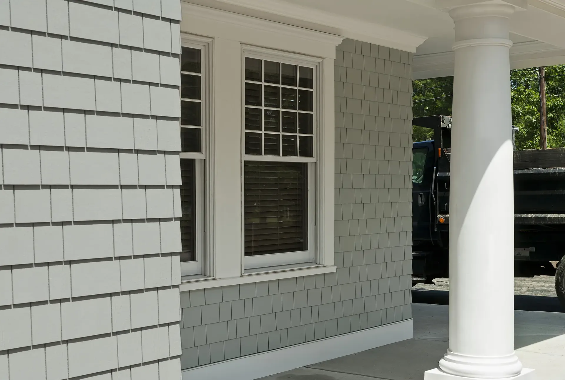 https://www.safeharborexteriors.com/wp-content/uploads/2022/11/hardieshingle-vs-cedar-shakes-01.jpg
