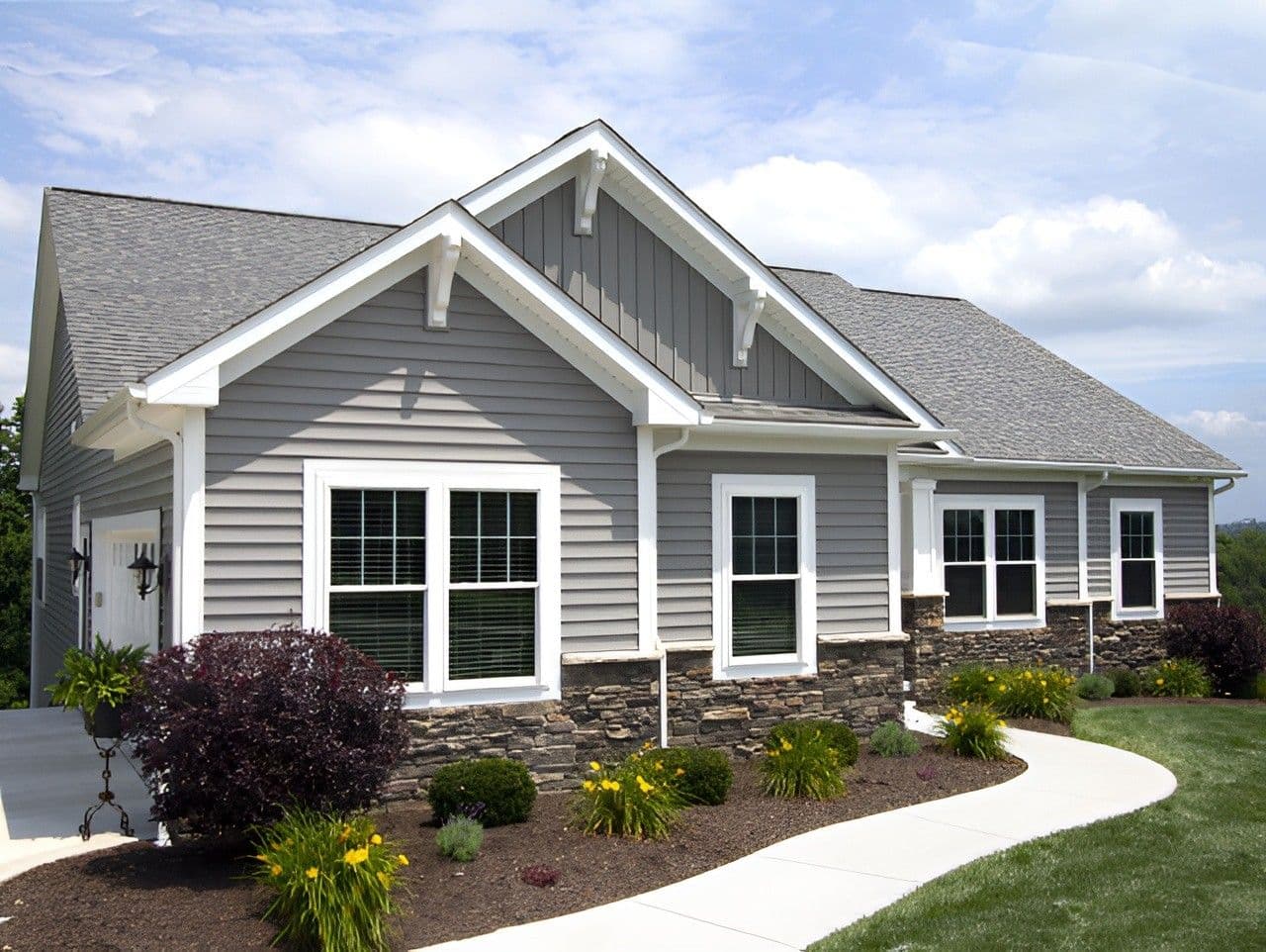 A gray house with Wincore 5400 windows.