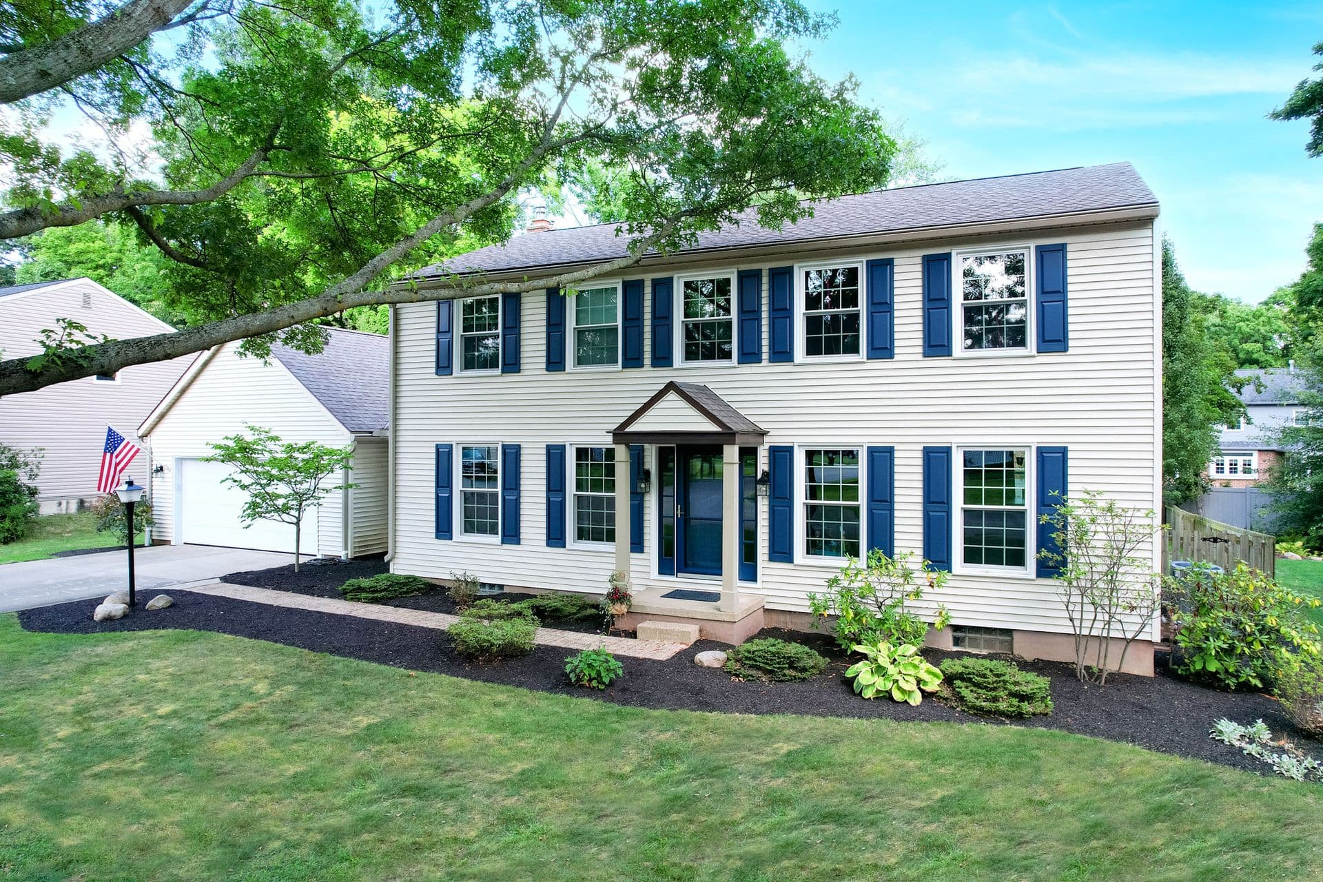 ProVia Endure™ Double Hung white Windows on a Colonial-style home.