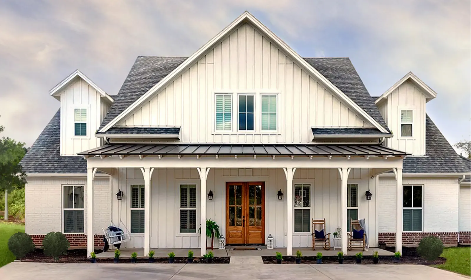 A white house with new siding.